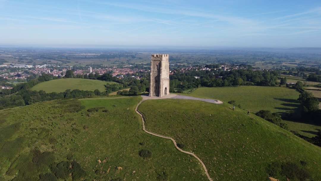 An aerial view of a tower on a hill