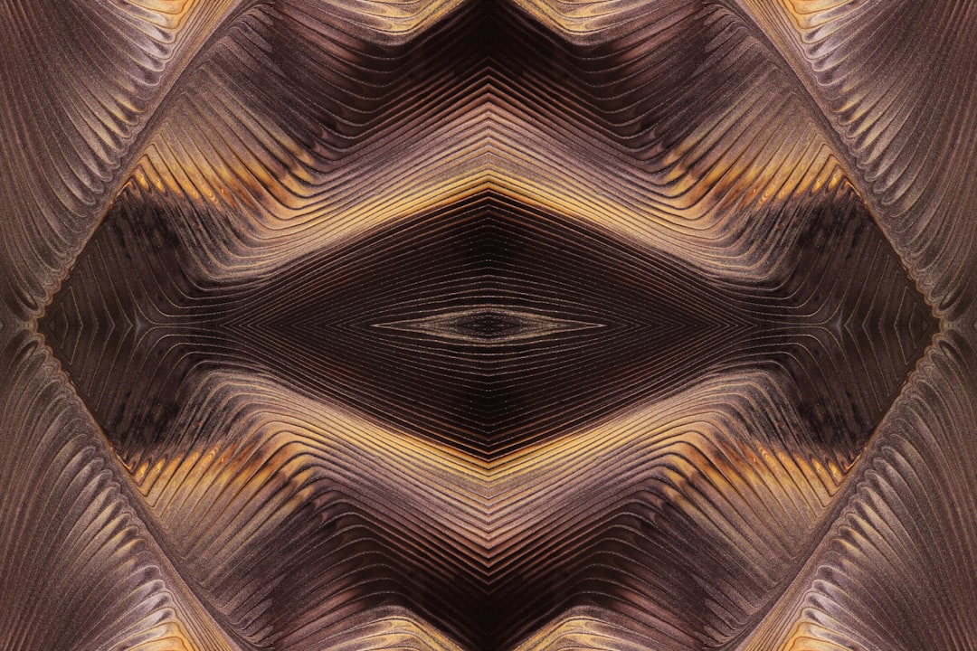 an abstract image of a brown and gold pattern